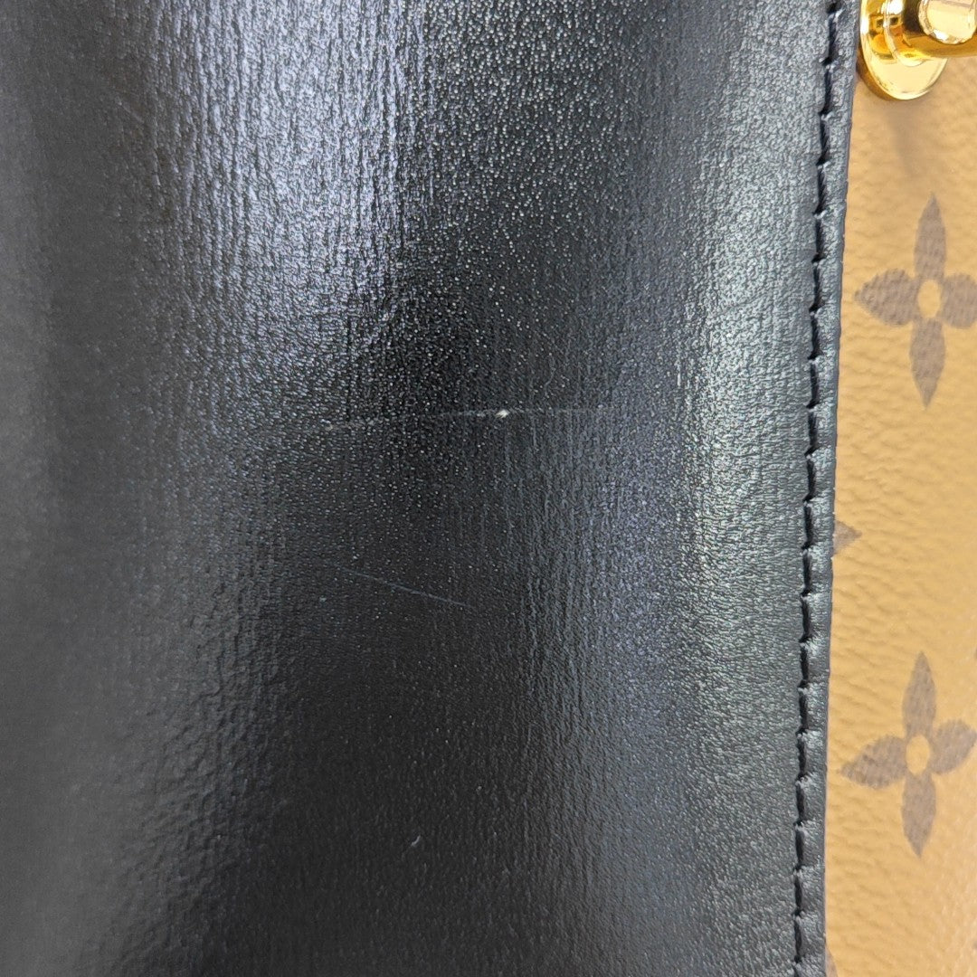 CANNES PM Monogram Coated Canvas Brown