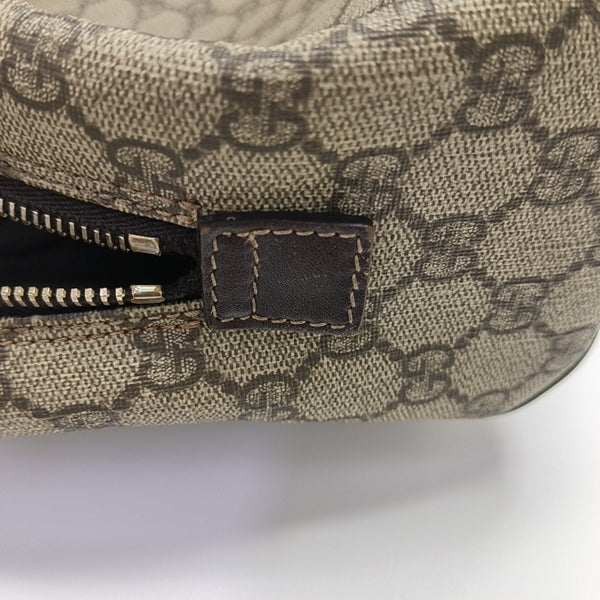 Monogram Coated Canvas Clutch Brown