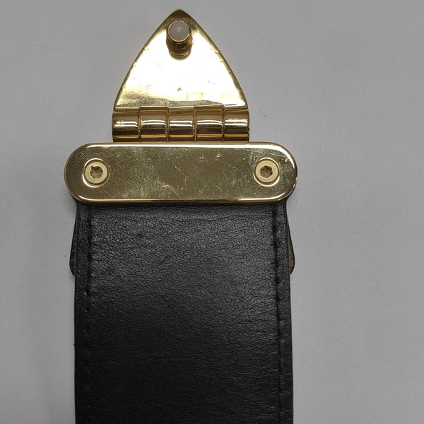 TRUNK Monogram Coated Canvas Brown