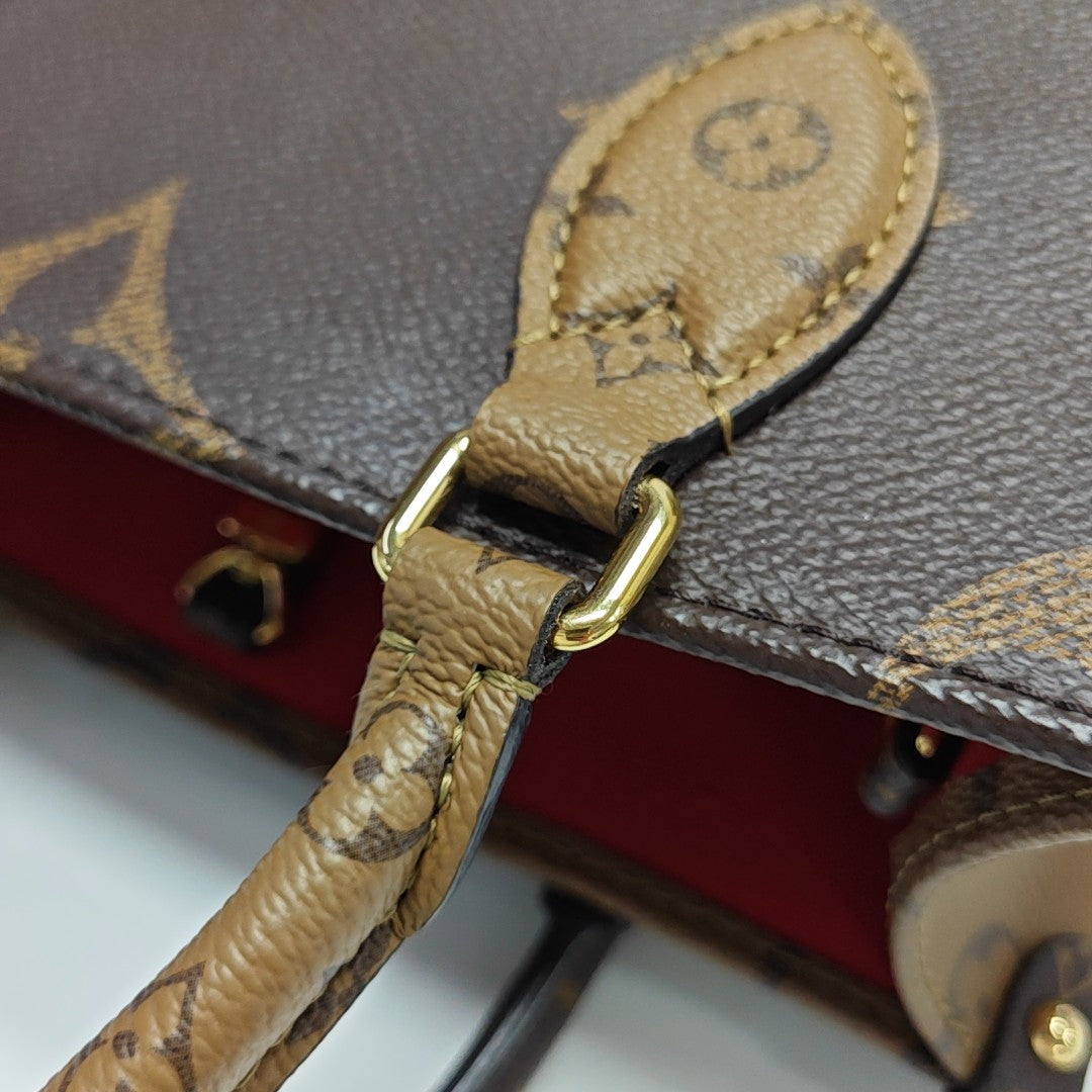 ONTHEGO PM Monogram Coated Canvas Brown