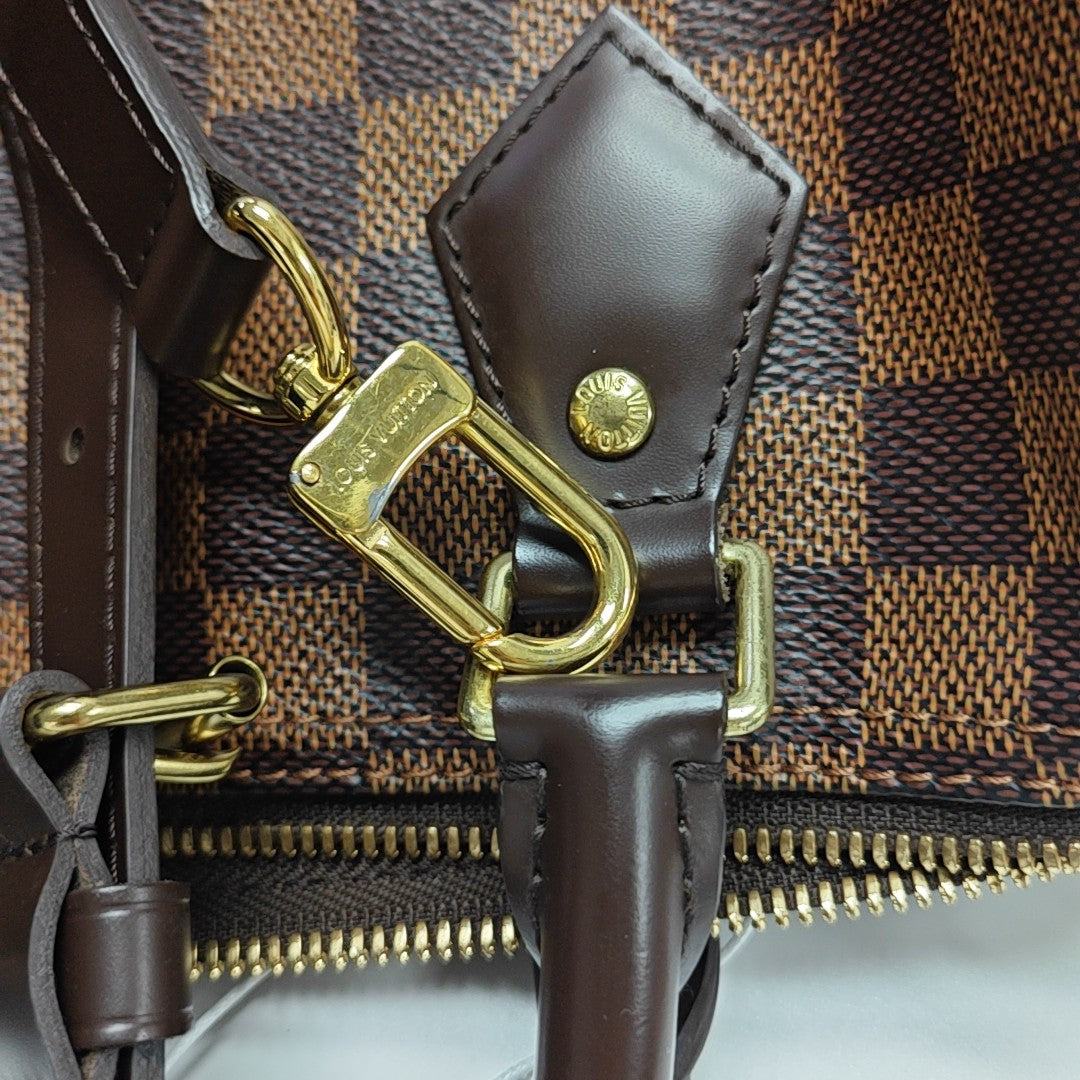SPEEDY 25 Damier Ebene Coated Canvas Brown