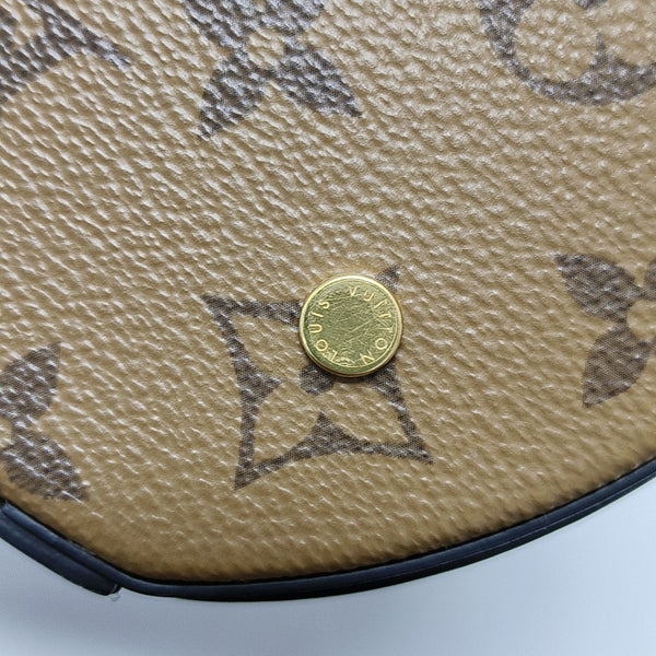 CANNES PM Monogram Coated Canvas Brown