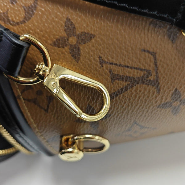 CANNES PM Monogram Coated Canvas Brown