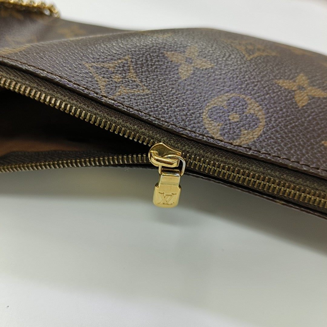 EVA Monogram Coated Canvas Brown