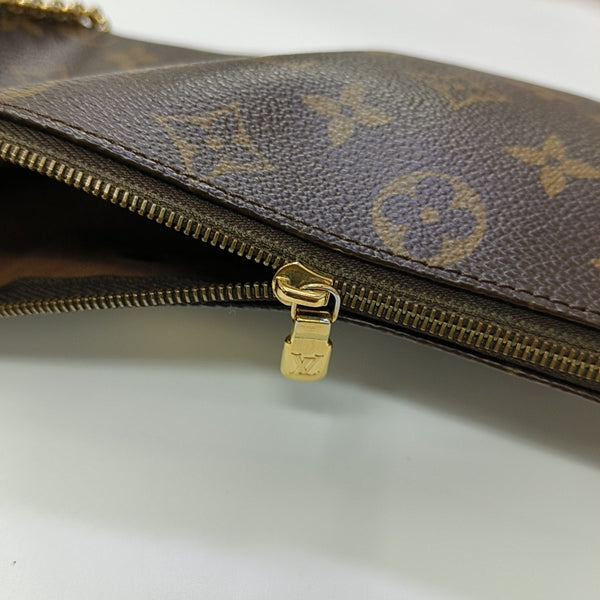 EVA Monogram Coated Canvas Brown