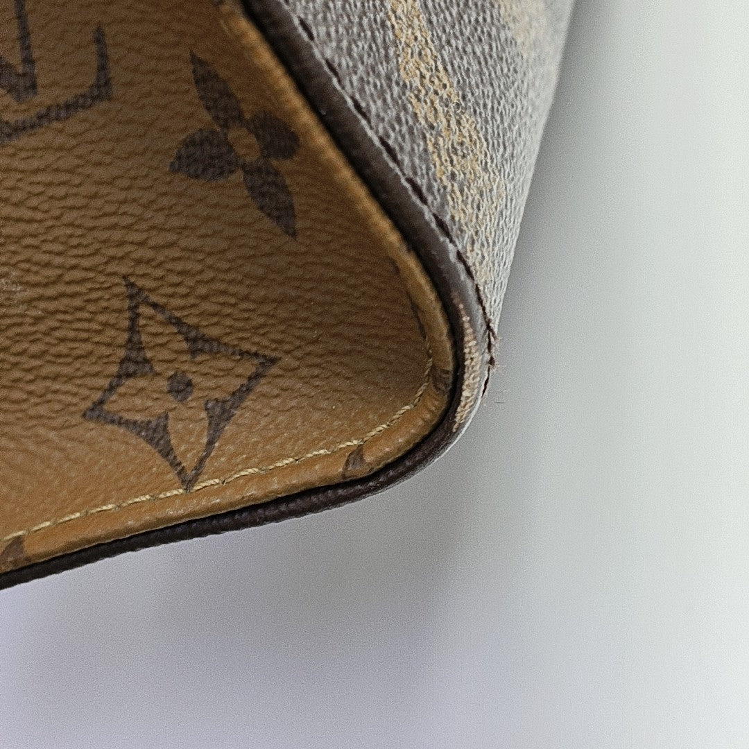 ONTHEGO MM Monogram Coated Canvas Brown