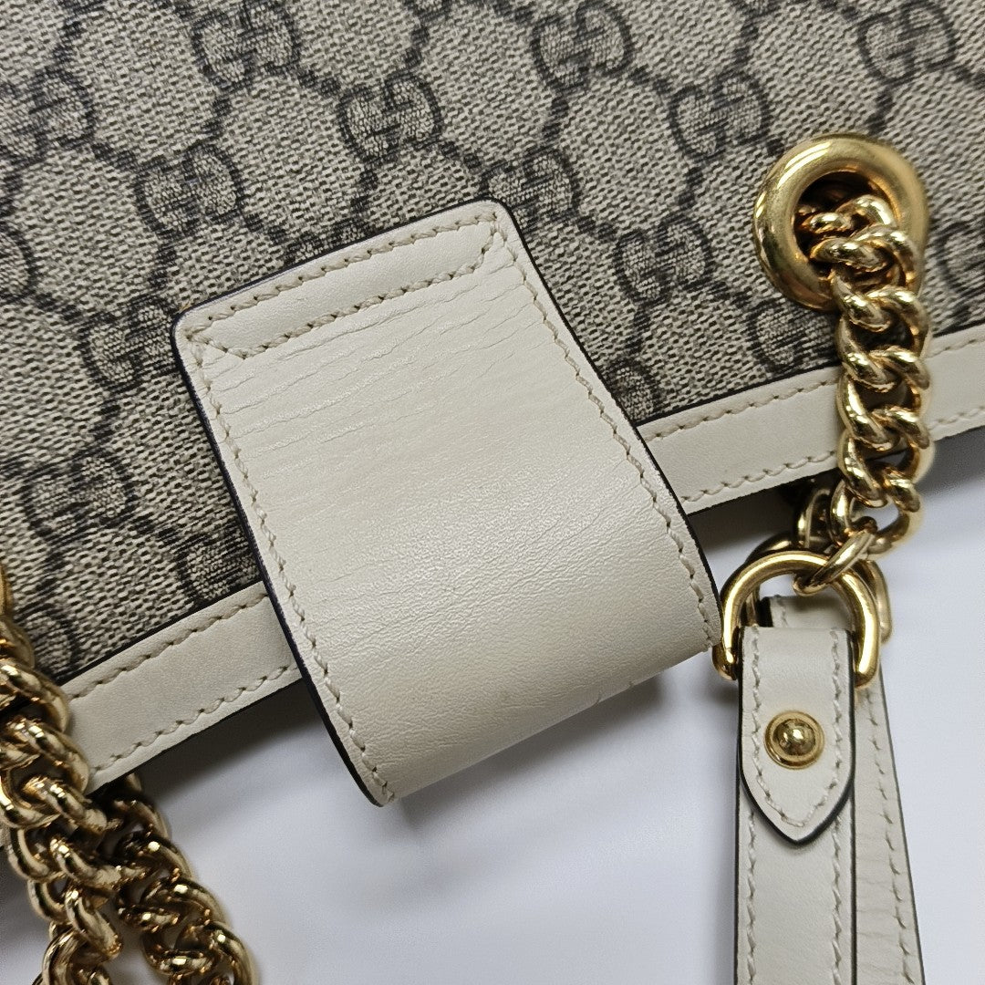 Padlock Small Monogram Coated Canvas Beige