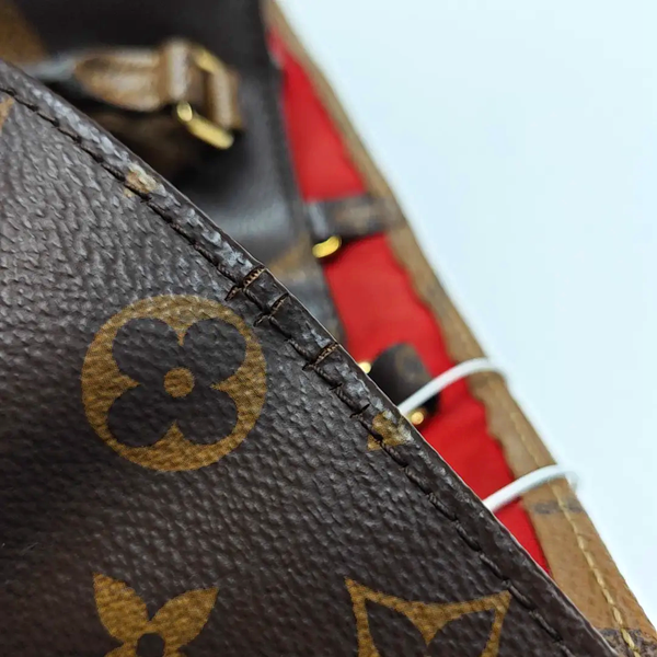 ONTHEGO MM Monogram Coated Canvas Brown