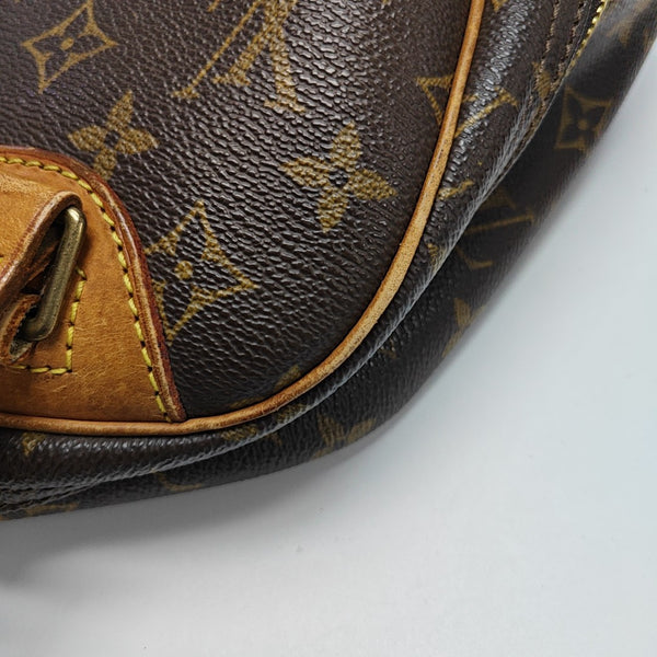 EXCURSION Monogram Coated Canvas Brown