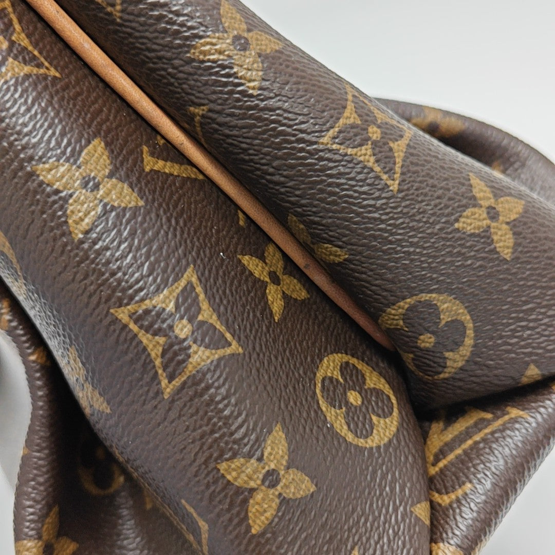 RIVOLI MM Monogram Coated Canvas Brown