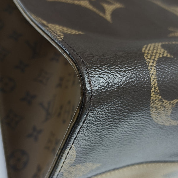 ONTHEGO GM Monogram Coated Canvas Brown