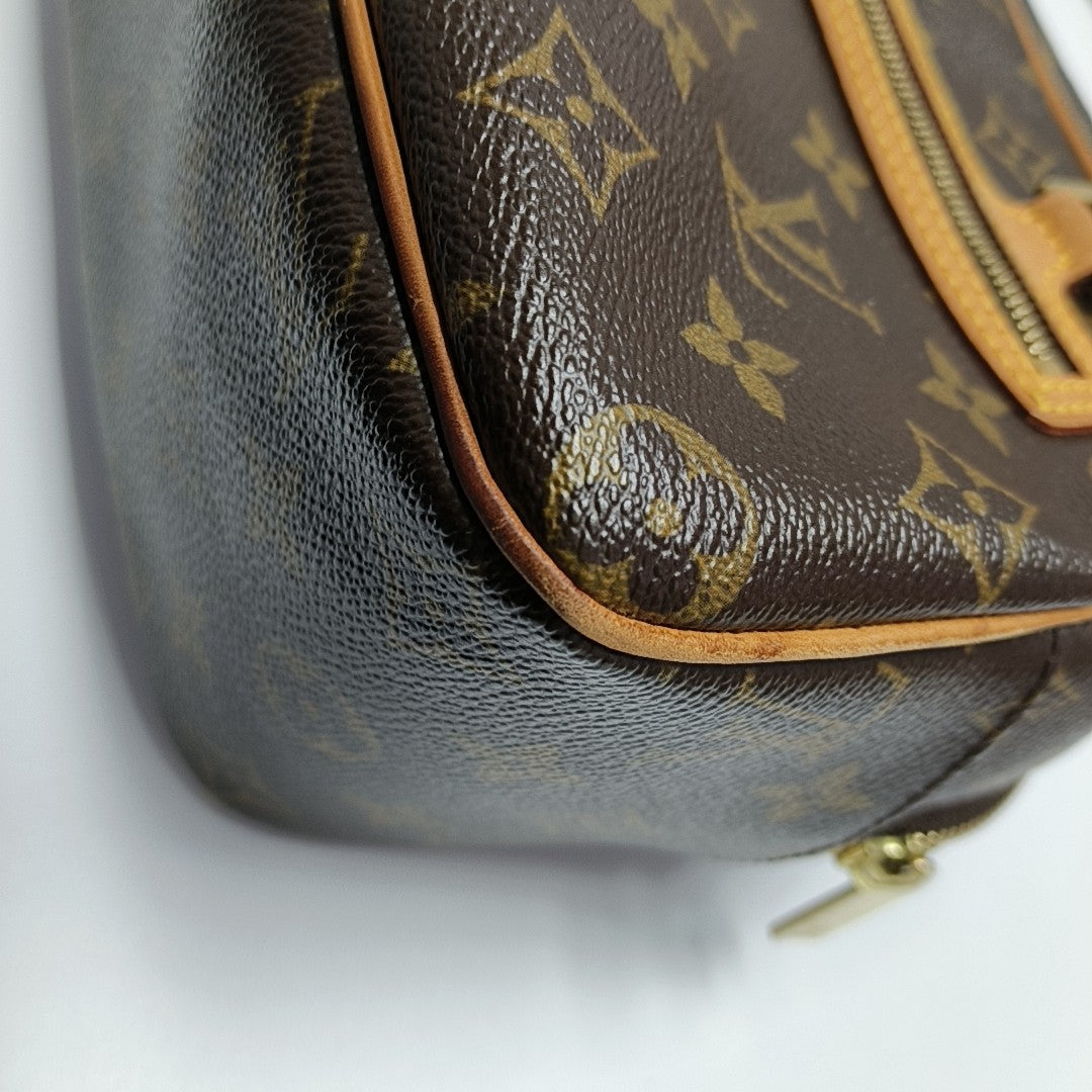 CITE MM Monogram Coated Canvas Brown