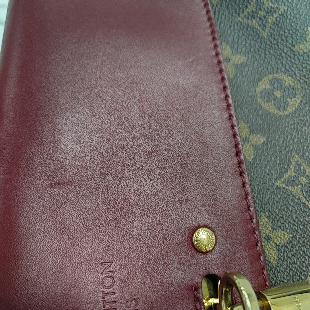 VÉNUS Monogram Coated Canvas Brown
