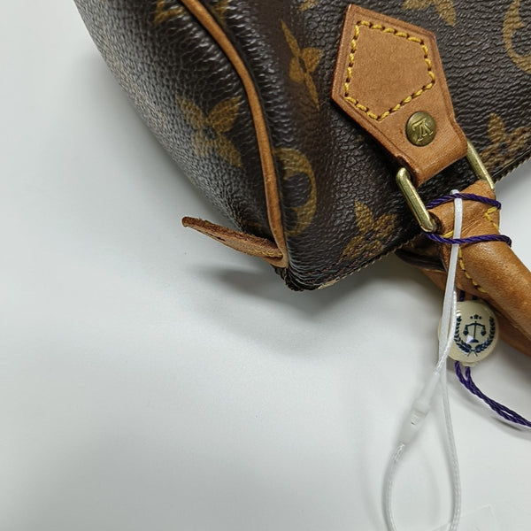 SPEEDY Monogram Coated Canvas Brown