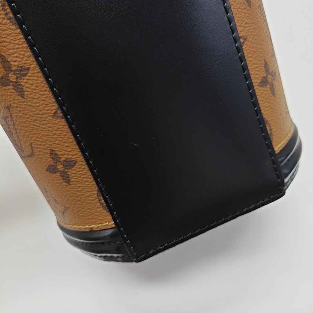 CANNES PM Monogram Coated Canvas Brown