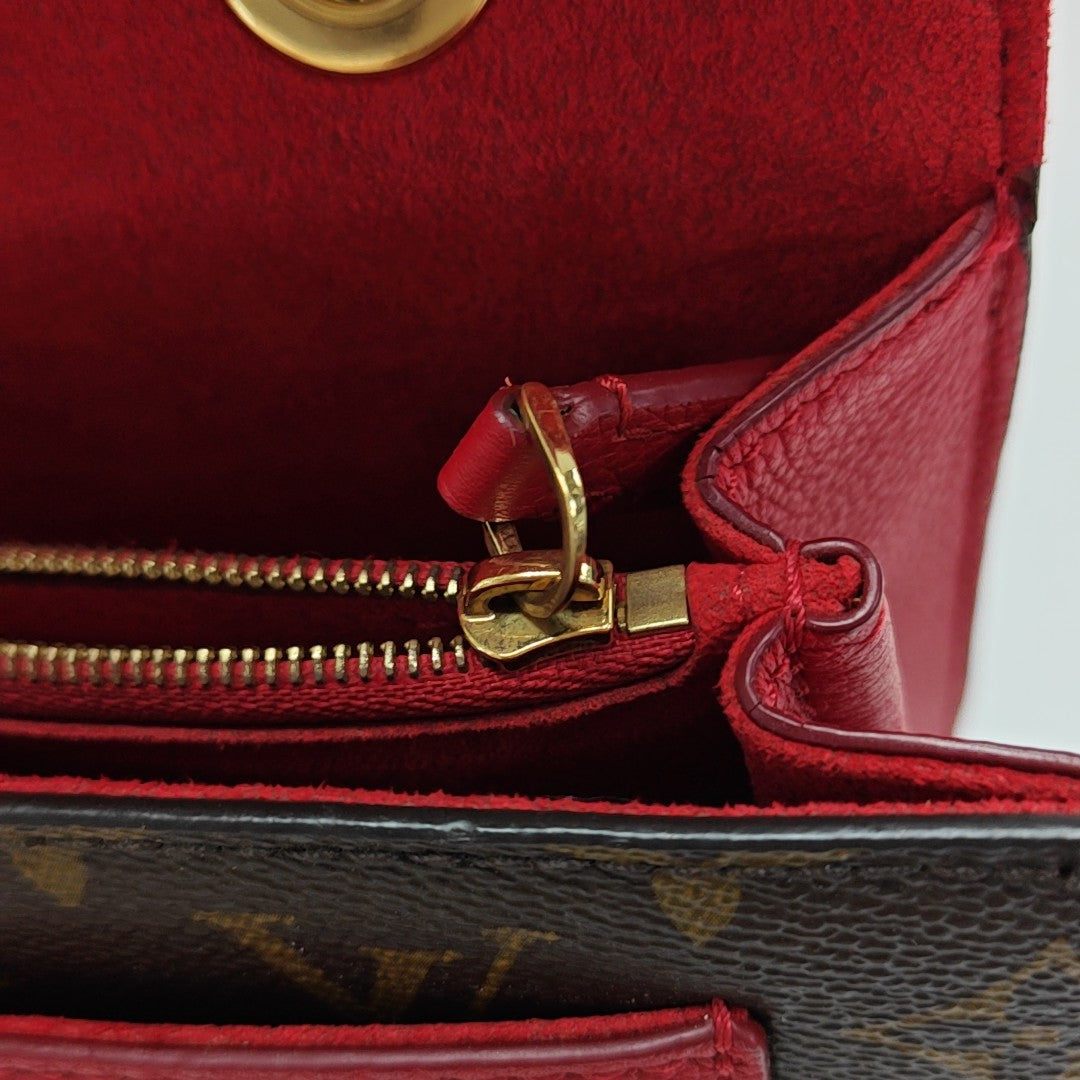 VICTOIRE Monogram Coated Canvas Brown