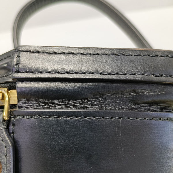 CANNES PM Monogram Coated Canvas Brown