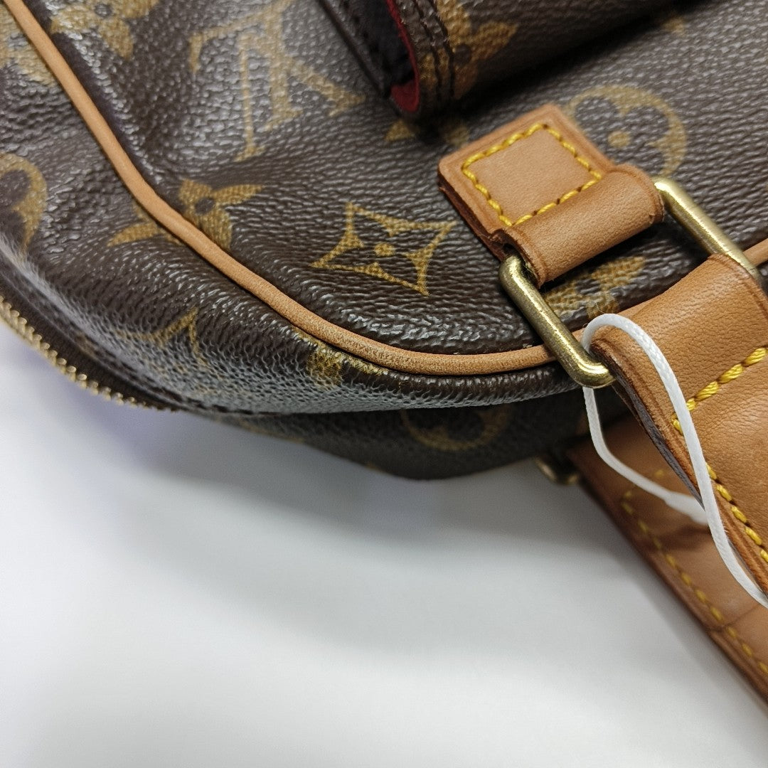 EXCENTRI-CITE Monogram Coated Canvas Brown