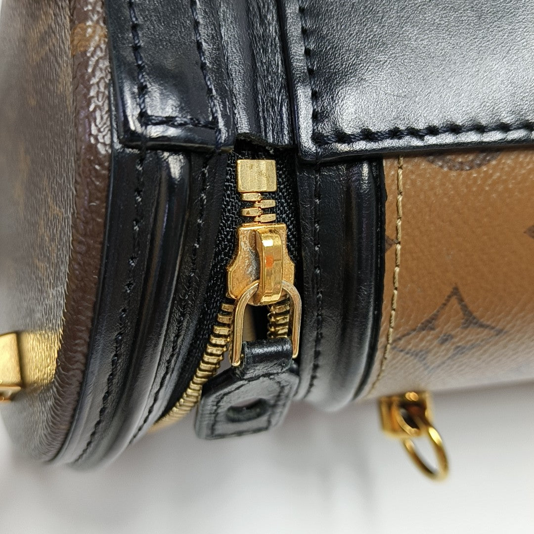 CANNES PM Monogram Coated Canvas Brown
