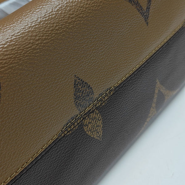 ONTHEGO MM Monogram Coated Canvas Brown