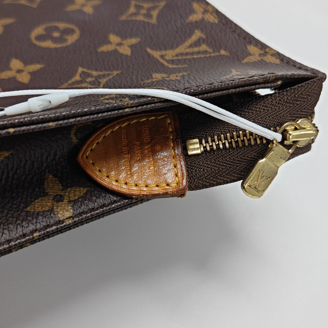 TOILET POCKET 26 Monogram Coated Canvas Brown