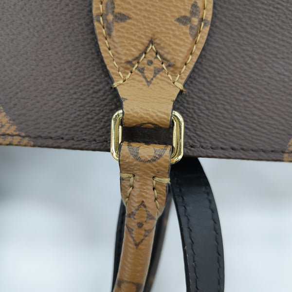 ONTHEGO MM Monogram Coated Canvas Brown