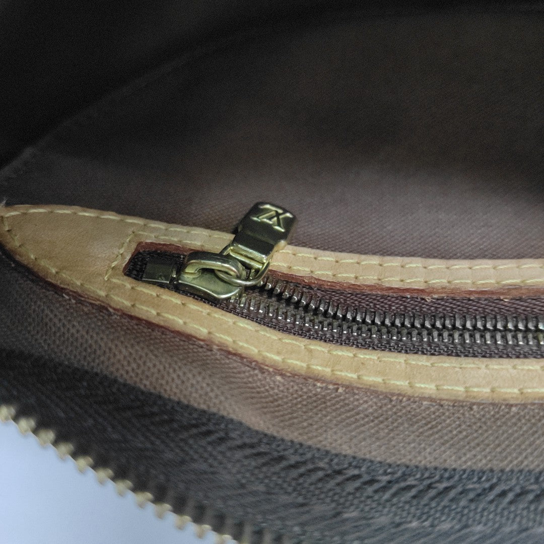 SPEEDY 25 Monogram Coated Canvas Brown