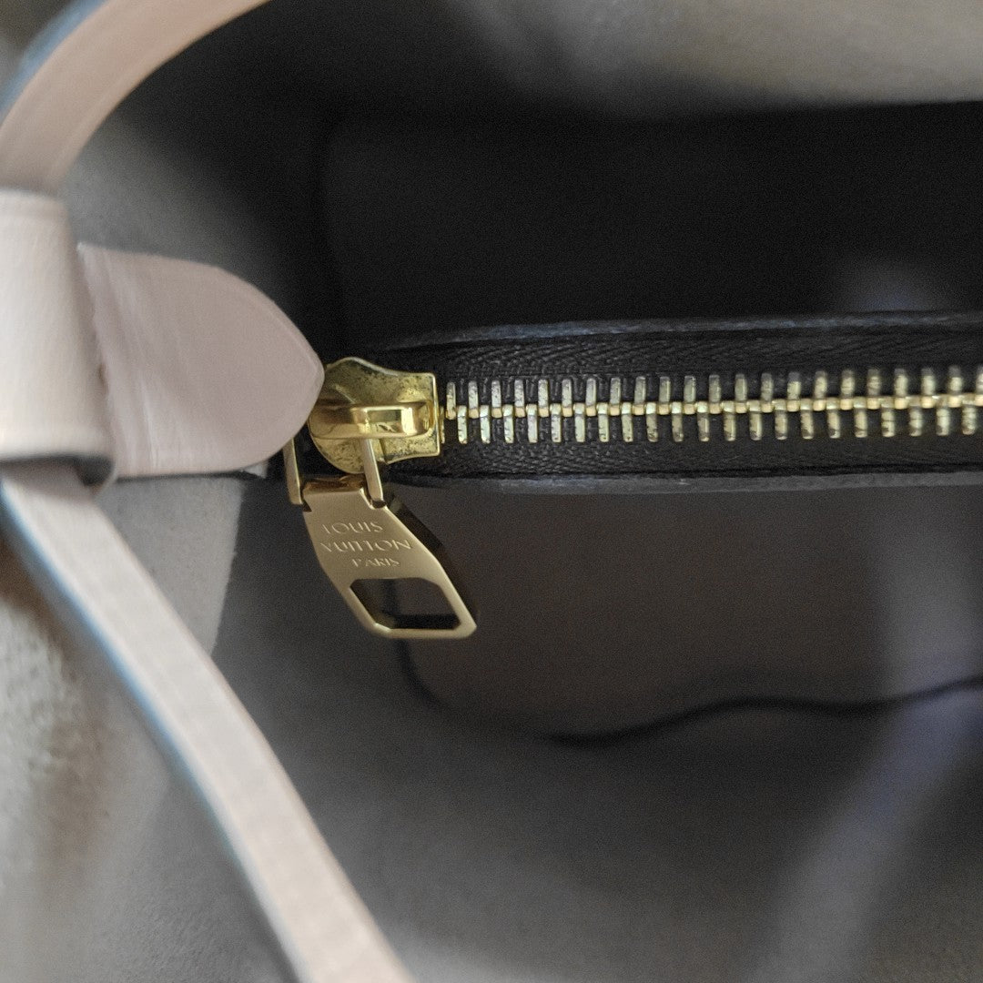 NÉONOÉ MM Monogram Coated Canvas Brown