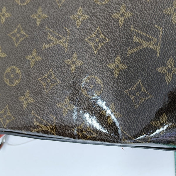 EXPLORER Monogram Coated Canvas Brown
