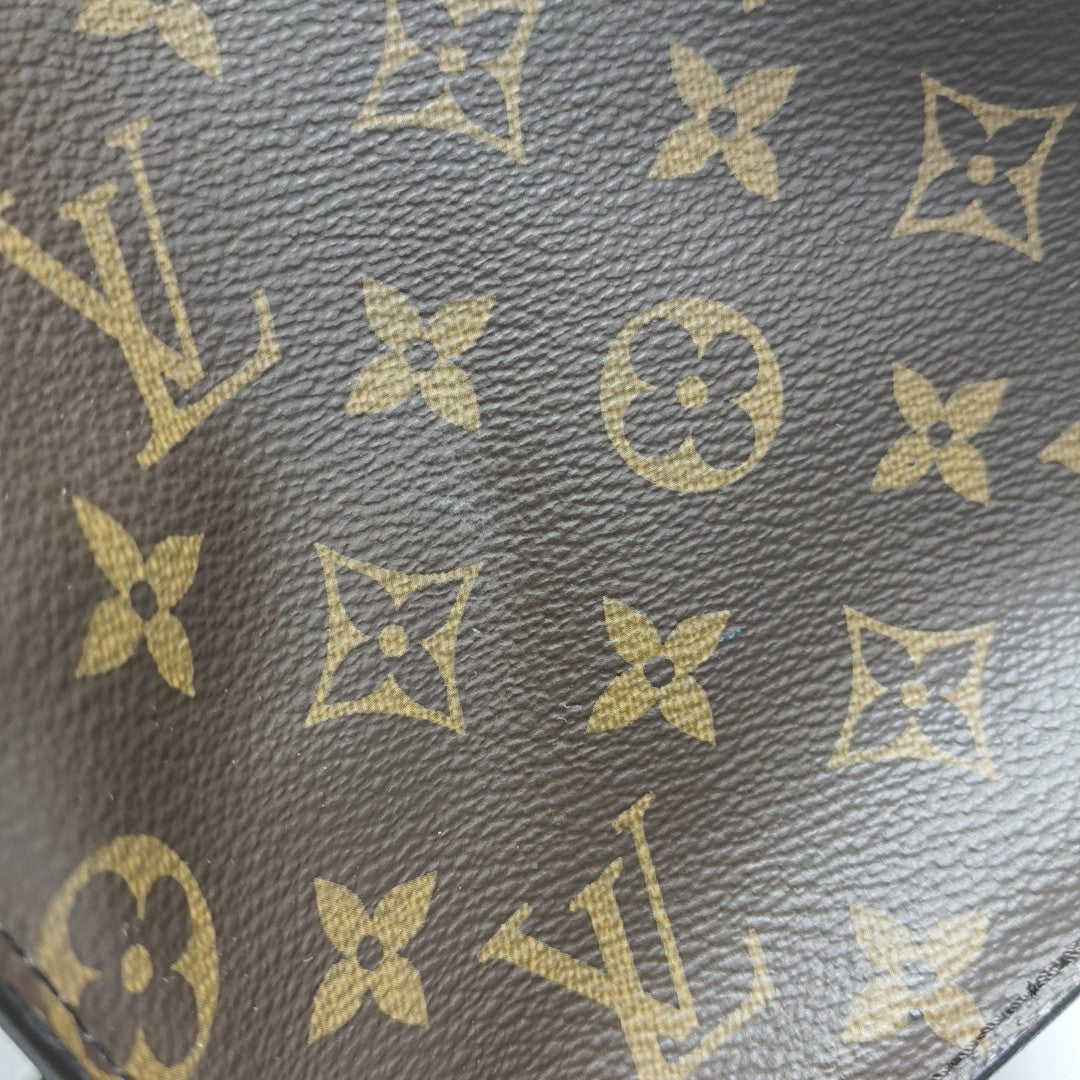 ONTHEGO GM Monogram Coated Canvas Brown