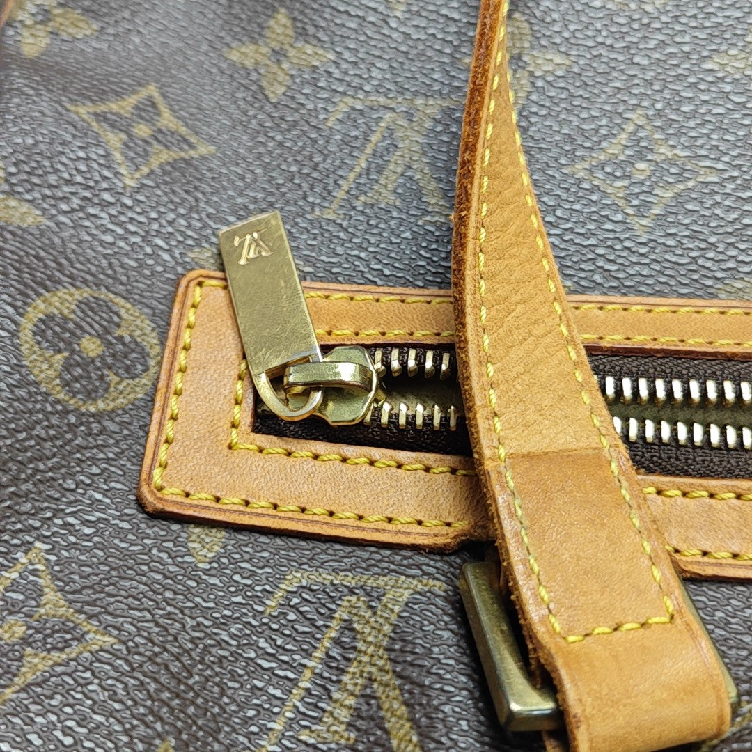 CITE GM Monogram Coated Canvas Brown