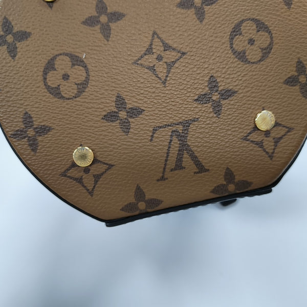 CANNES PM Monogram Coated Canvas Brown