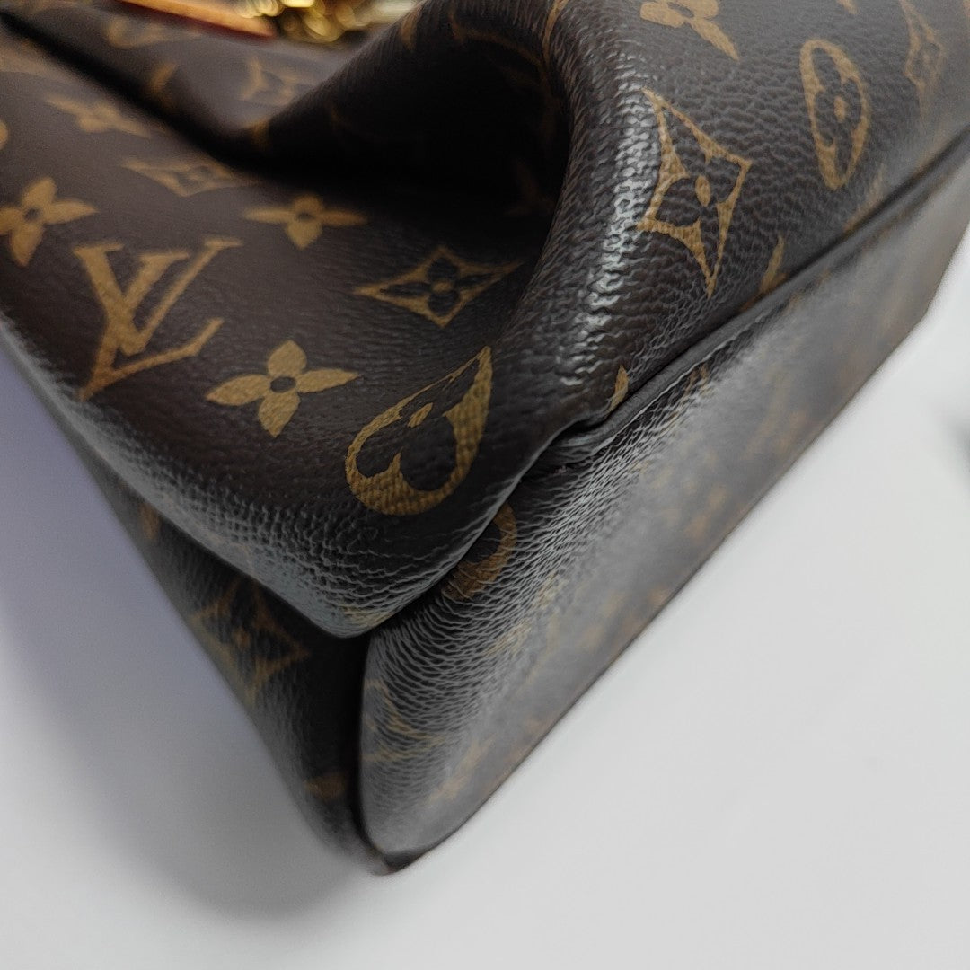 RIVOLI BB Monogram Coated Canvas Brown