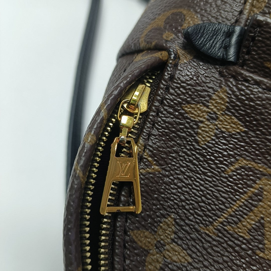 PALM SPRINGS Mini Monogram Coated Canvas Brown