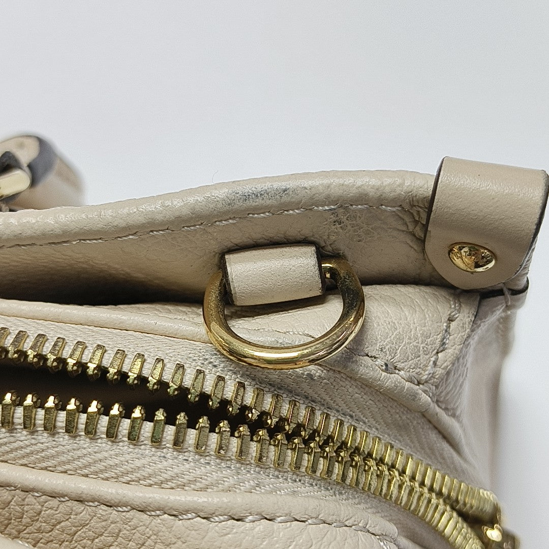 ONTHEGO EAST WEST PM Monogram Calfskin White