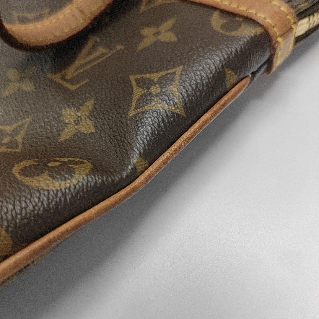 COUSSIN GM Monogram Coated Canvas Brown