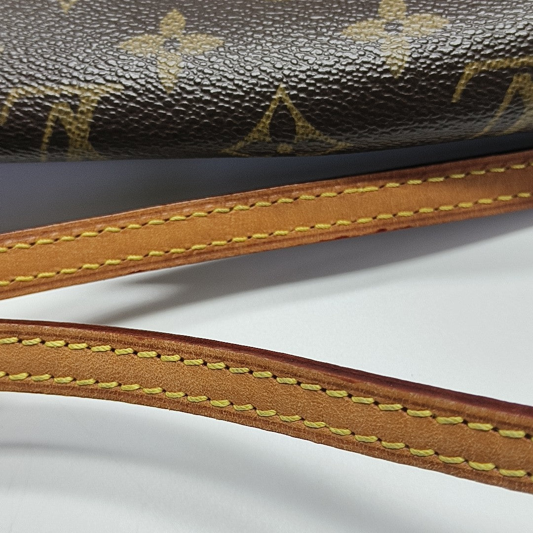 EVA Monogram Coated Canvas Brown