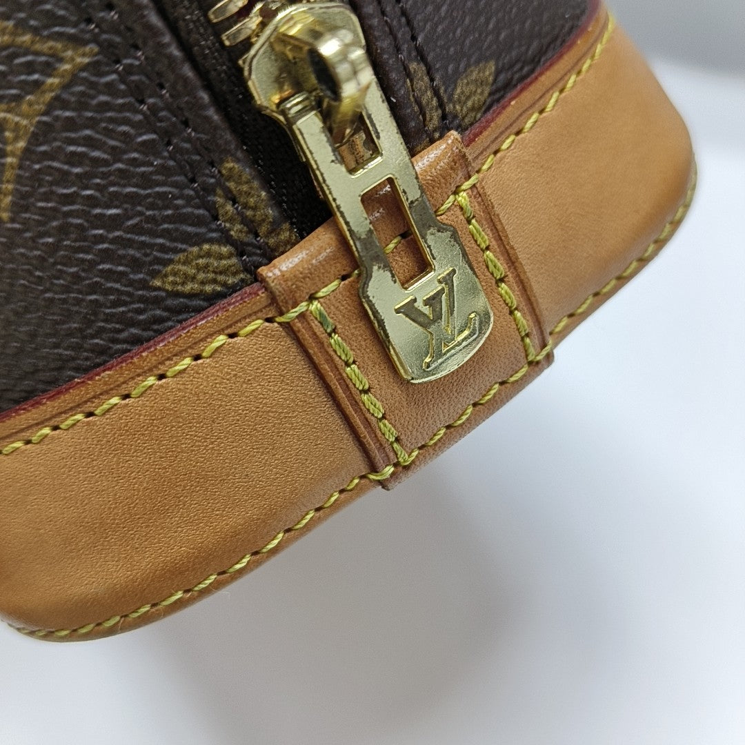 ALMA BB Monogram Coated Canvas Brown