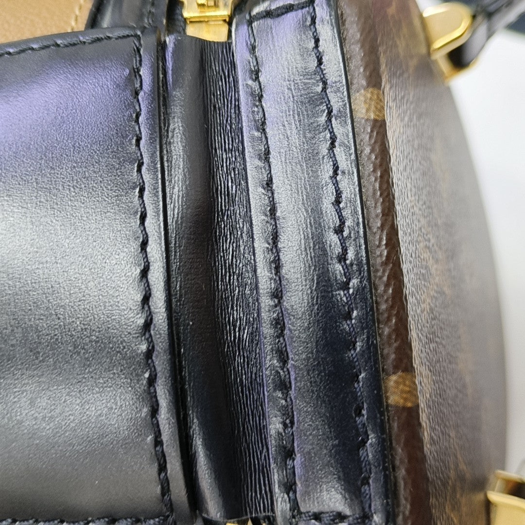CANNES PM Monogram Coated Canvas Brown