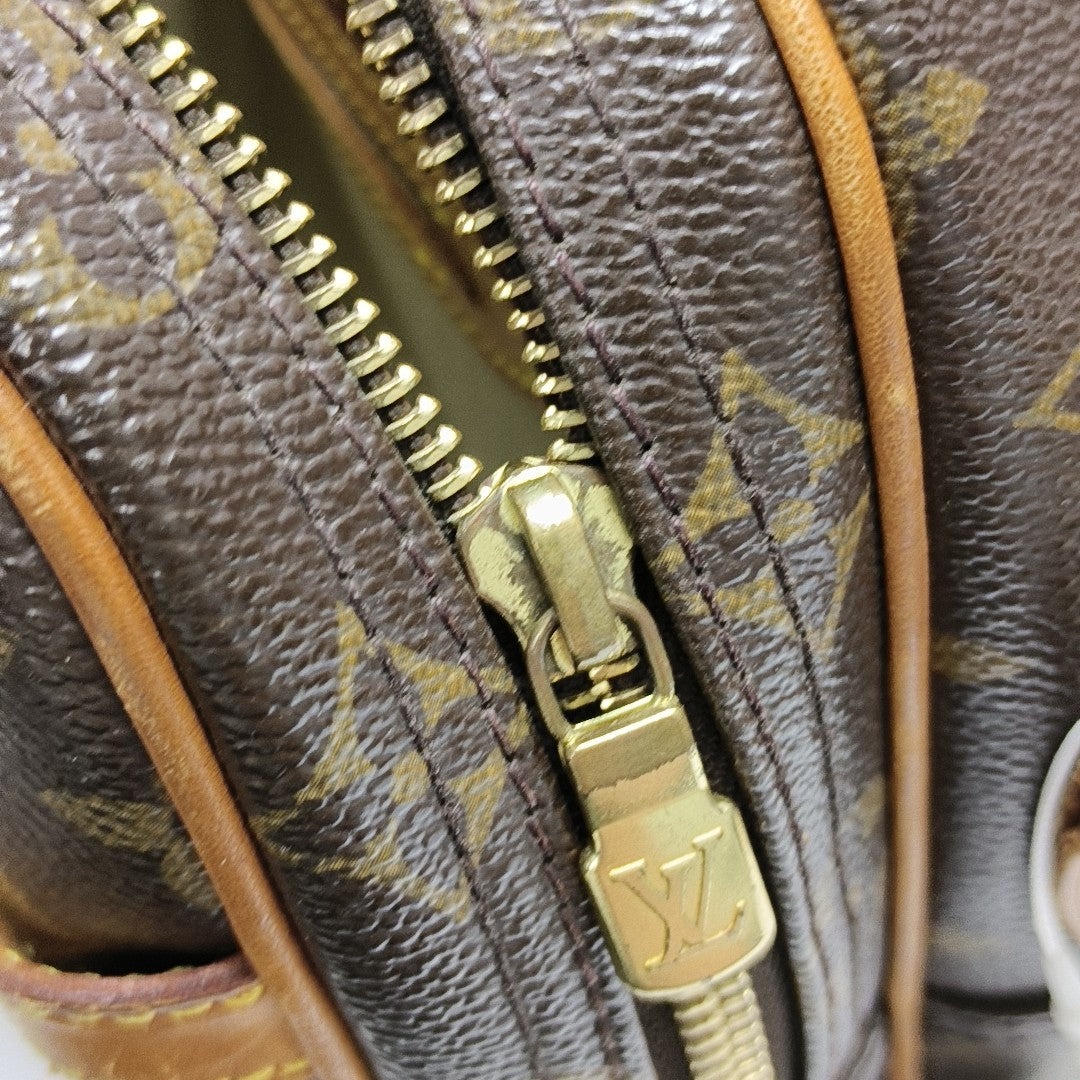 REPORTER Monogram Coated Canvas Brown