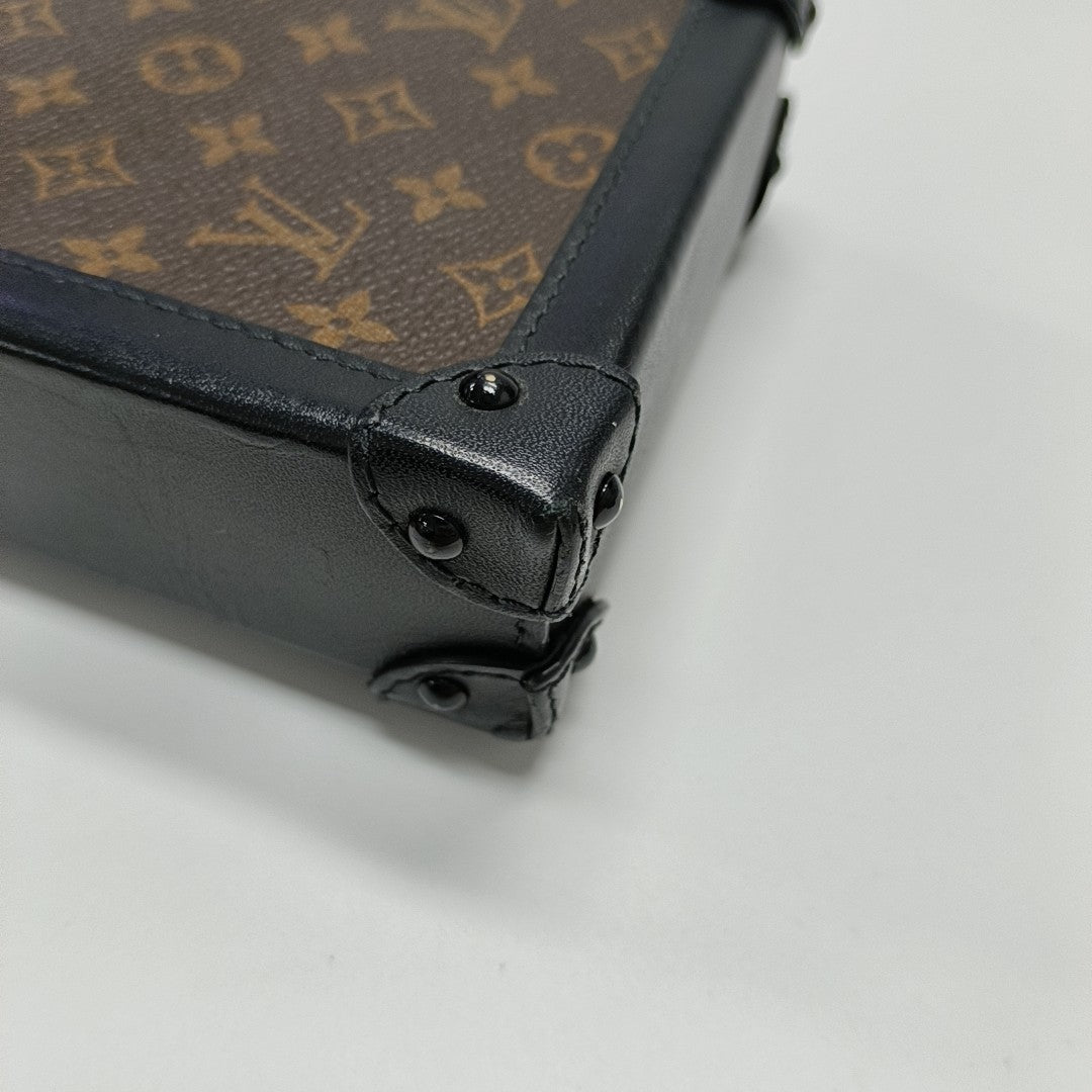 TRUNK Monogram Coated Canvas Brown