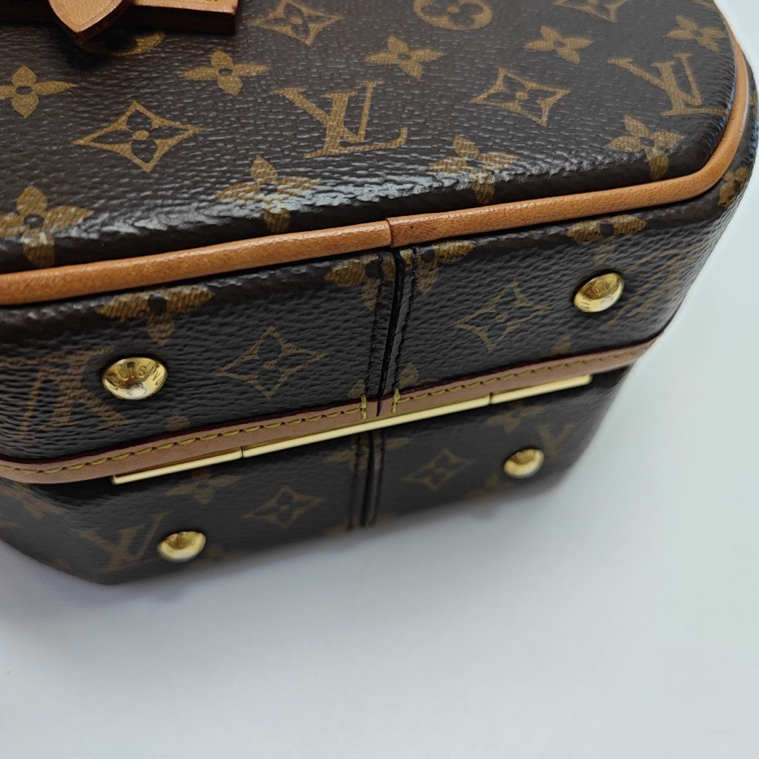 BOITE CHAPEAU PM Monogram Coated Canvas Brown