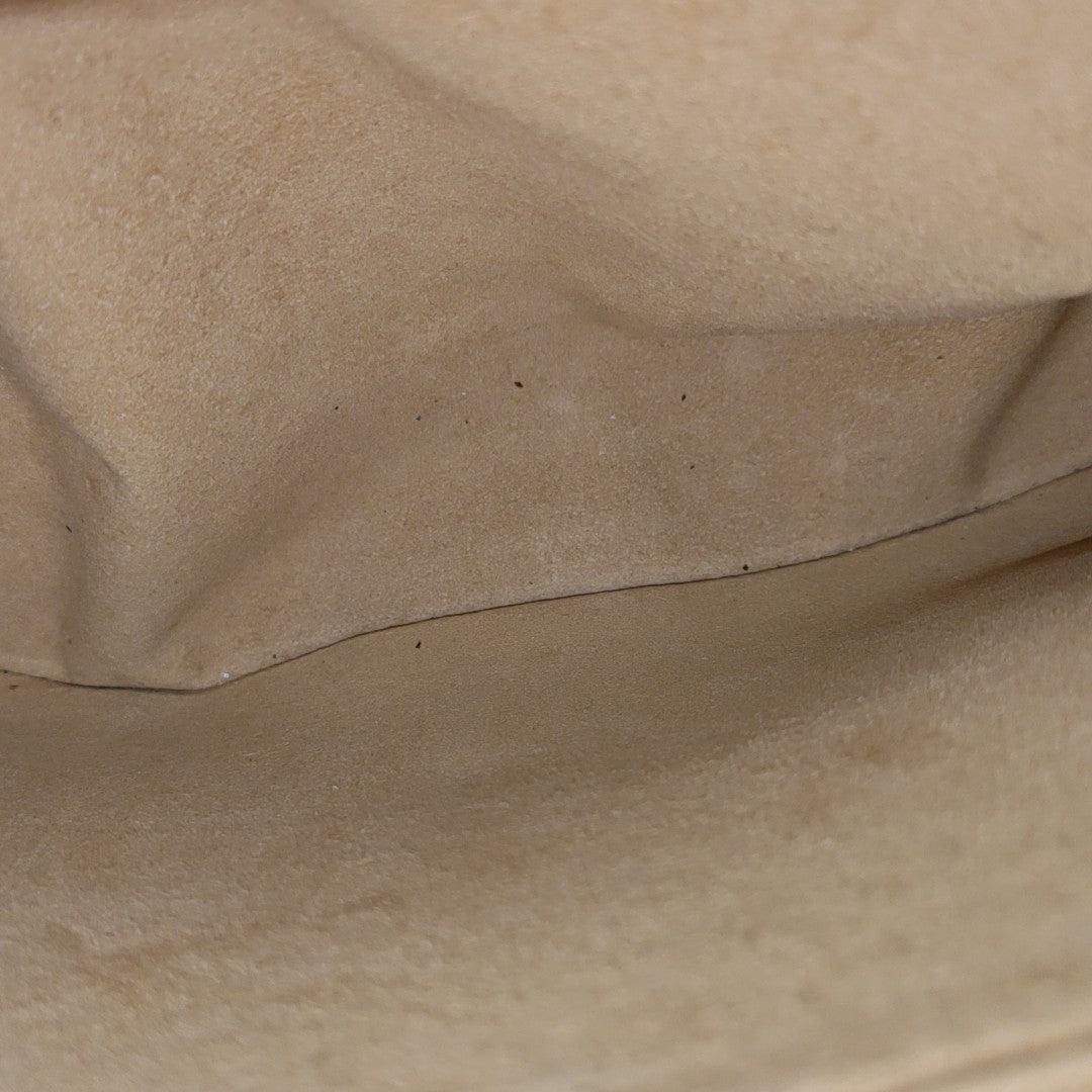 VÉNUS Monogram Coated Canvas Brown