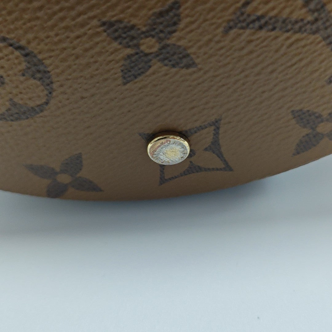 CANNES PM Monogram Coated Canvas Brown
