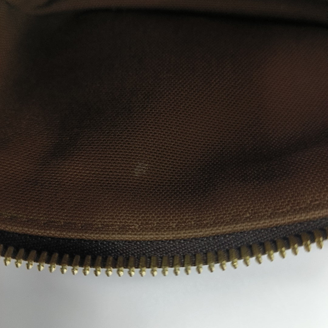 RUSH Monogram Coated Canvas Brown