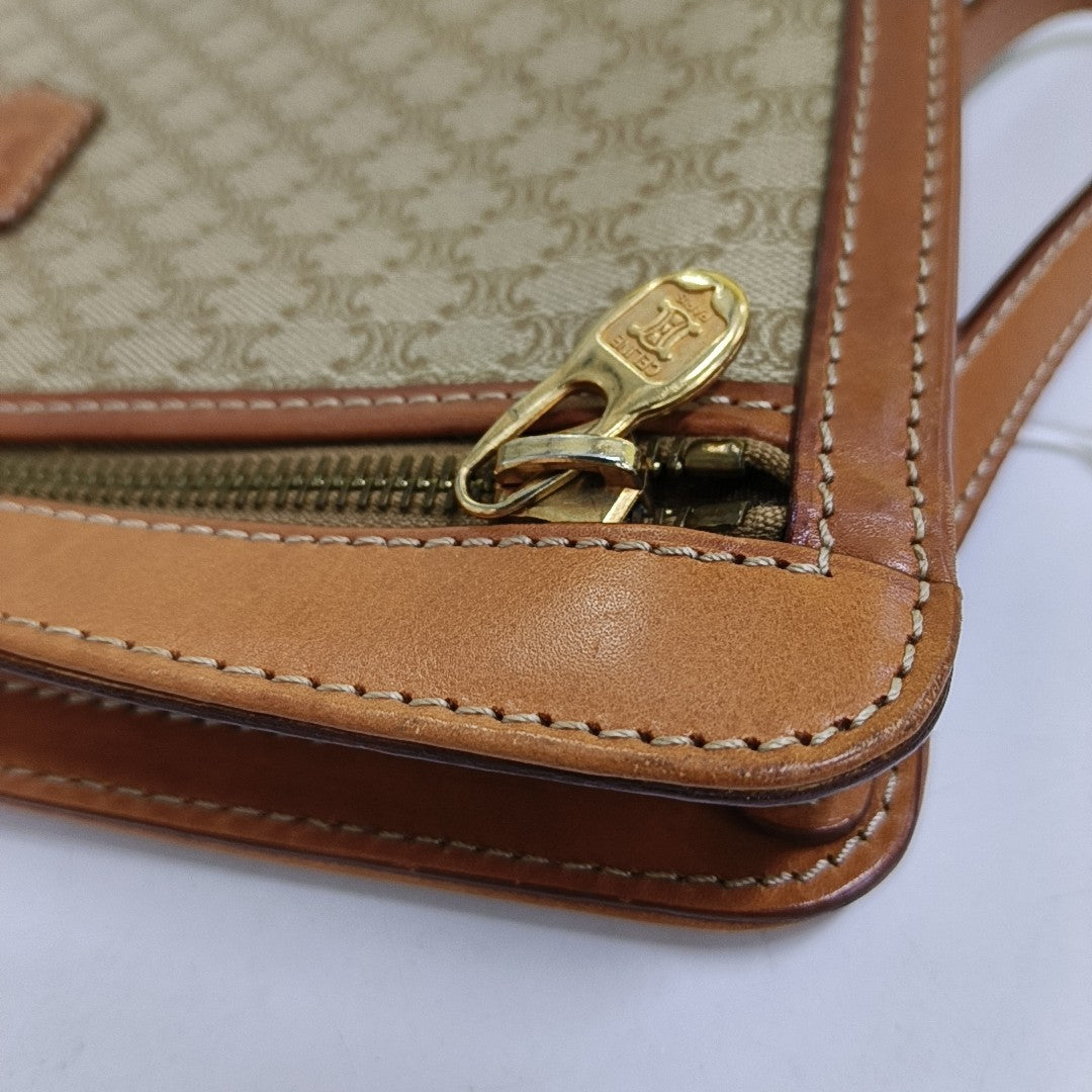 MACADAM CLUTCHES Coated Canvas Brown