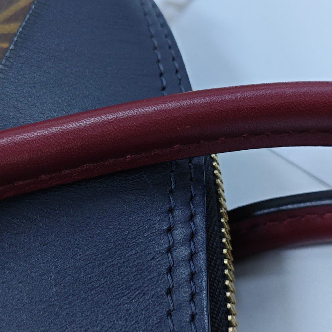 TUILERIES Monogram Coated Canvas Brown