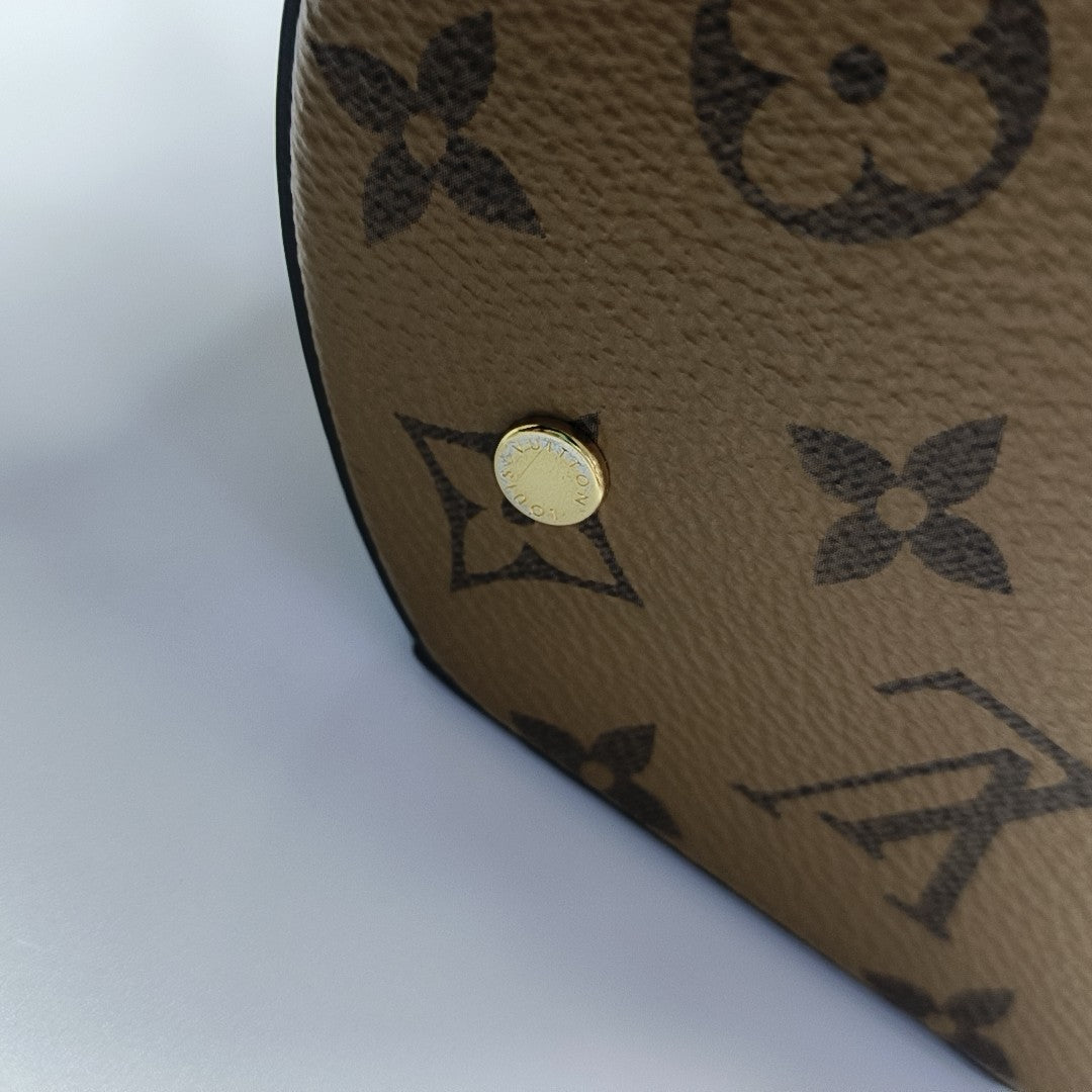 CANNES PM Monogram Coated Canvas Brown
