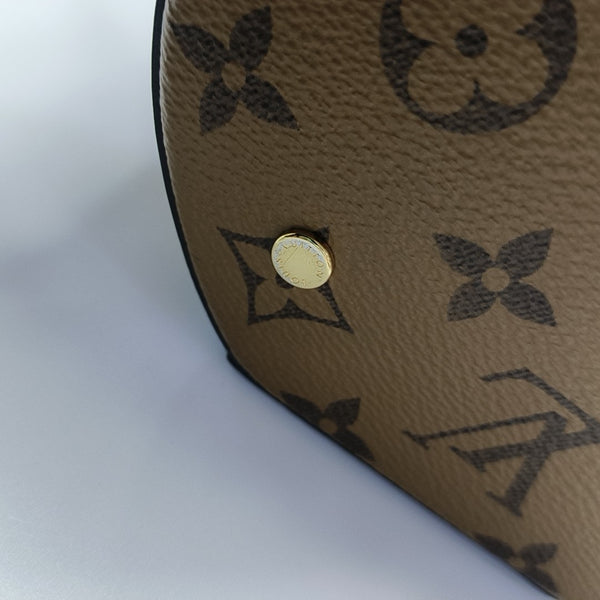 CANNES PM Monogram Coated Canvas Brown