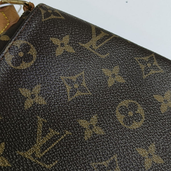 MUSETTE TANGO PM Monogram Coated Canvas Brown